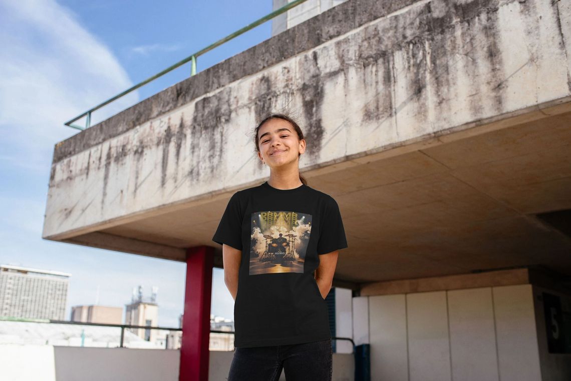 man wearing a customised Above Average DONT QUIT | DO IT tee and has the name ADAM added underneath in a graffiti style font