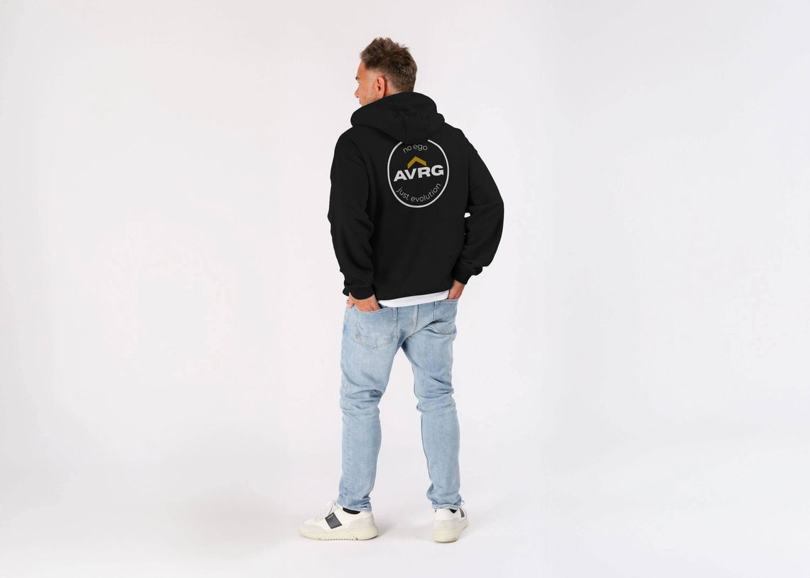man in a black Above Average Clothing hoodie with a large rear print