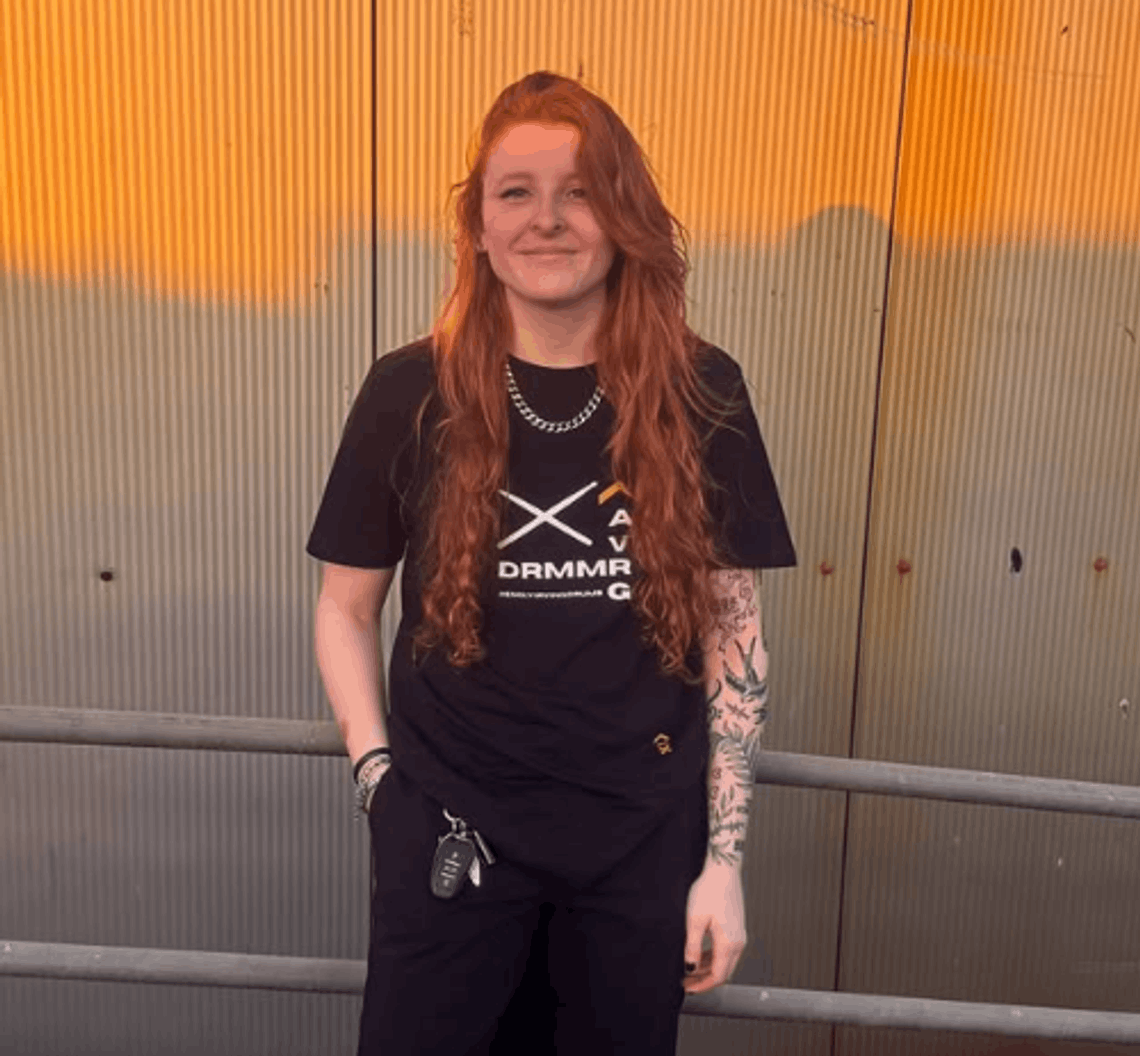 Emily Irving from the band Too Red wearing one of her special edition tees designed with Above Average Clothing Emily Irving from the band Too Red wearing one of her special edition tees designed with Above Average Clothing